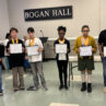 students holding certificates